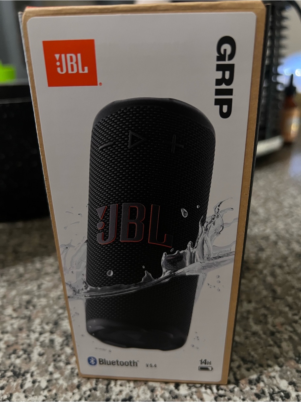 JBL Grip Portable Speaker in Black with Red Logo